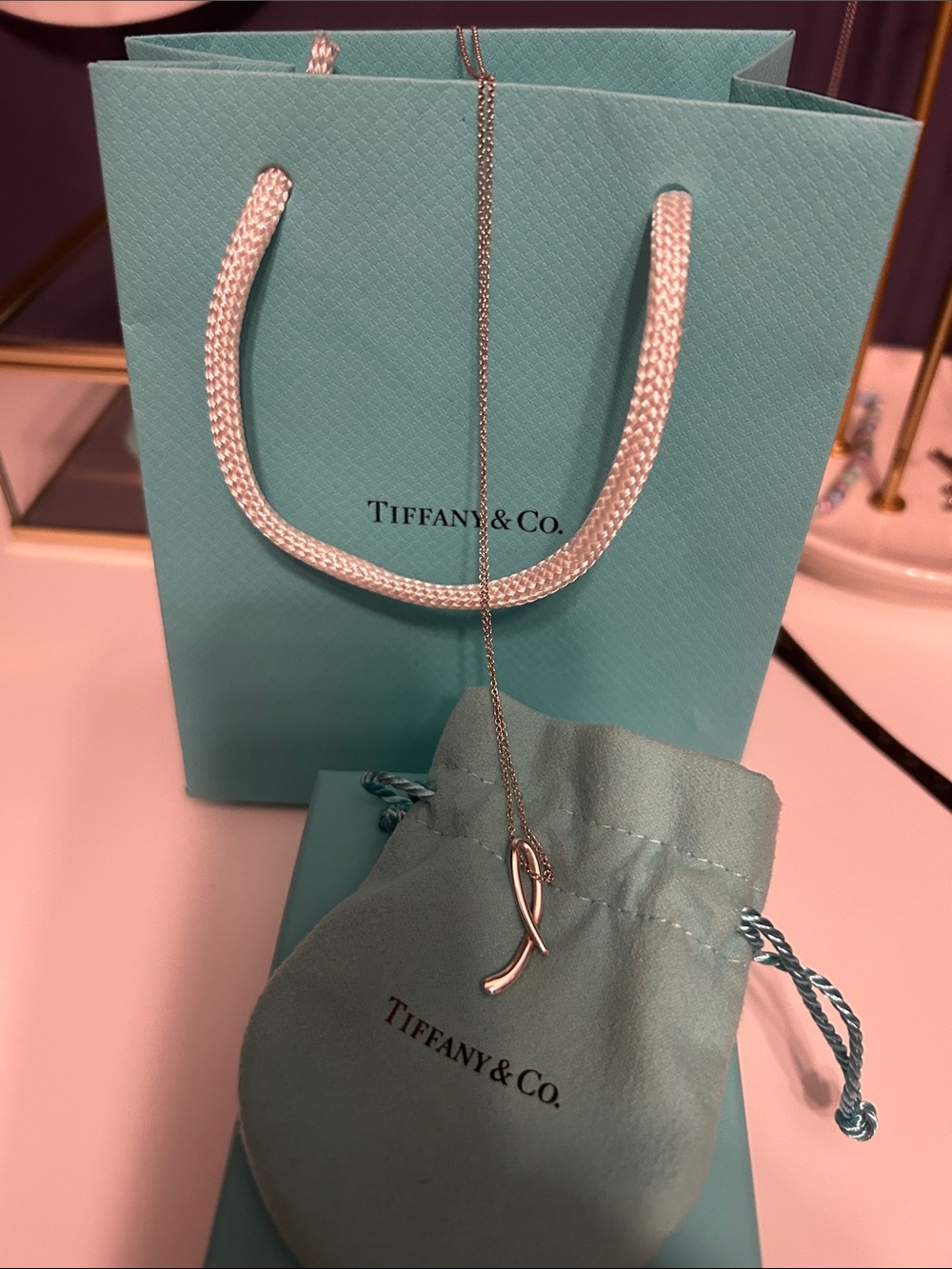 Tiffany & Co. Sterling Silver cursive “L” necklace